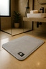Dywanik łazienkowy prostokątny antypoślizgowy WELCOME 50x80 jasny szary
